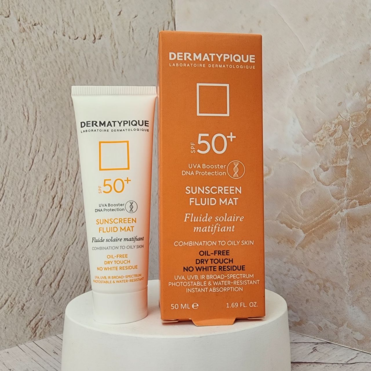 کرم ضد آفتاب بی رنگ درماتیپیک مدل Anti Acne با SPF+50 مخصوص پوست چرب حجم 40 میلی لیتر