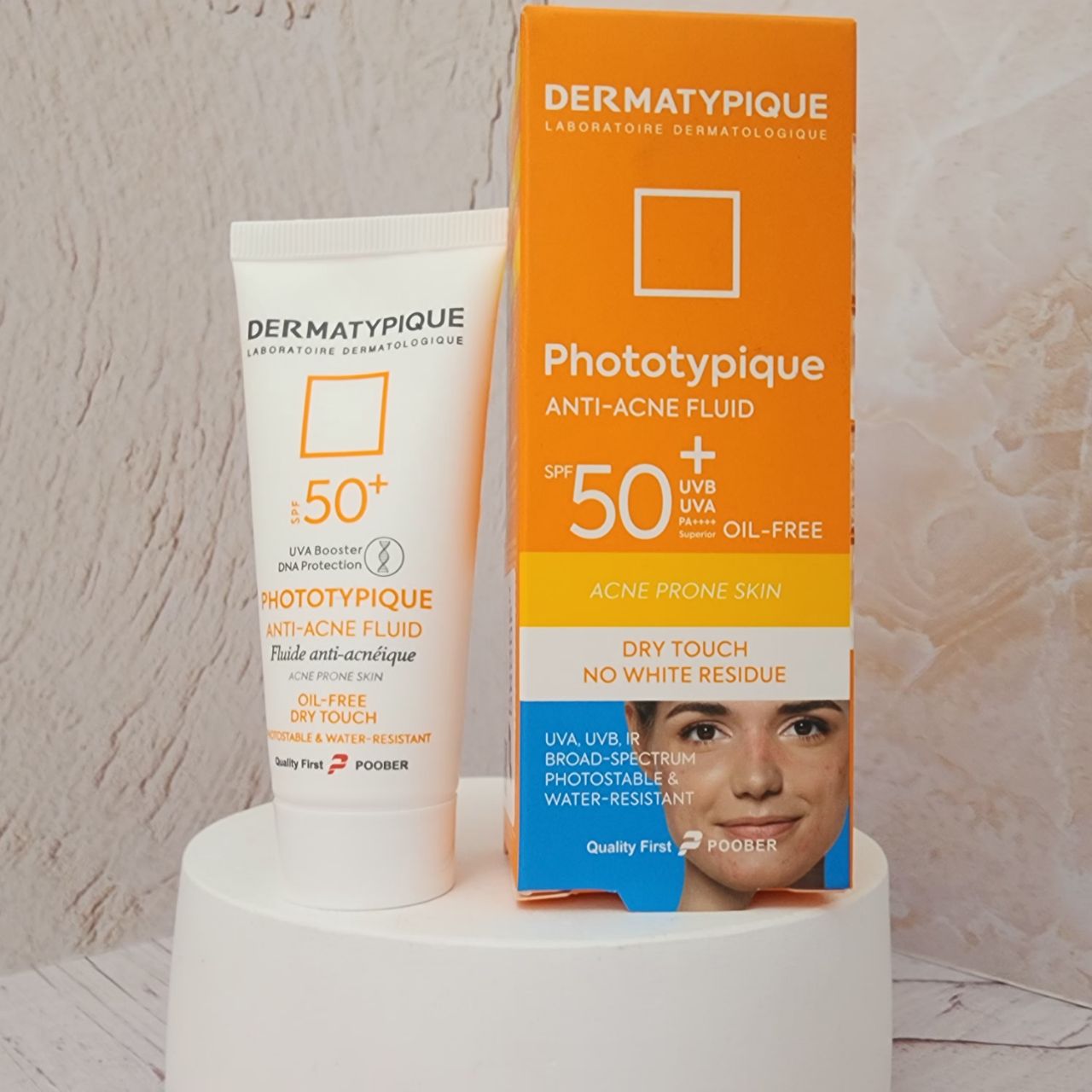 ضد آفتاب فلوئید آنتی آکنه درماتیپیک مدل Phototypique با Spf +50 مناسب پوست چرب و جوش دار حجم 40 میلی لیتر