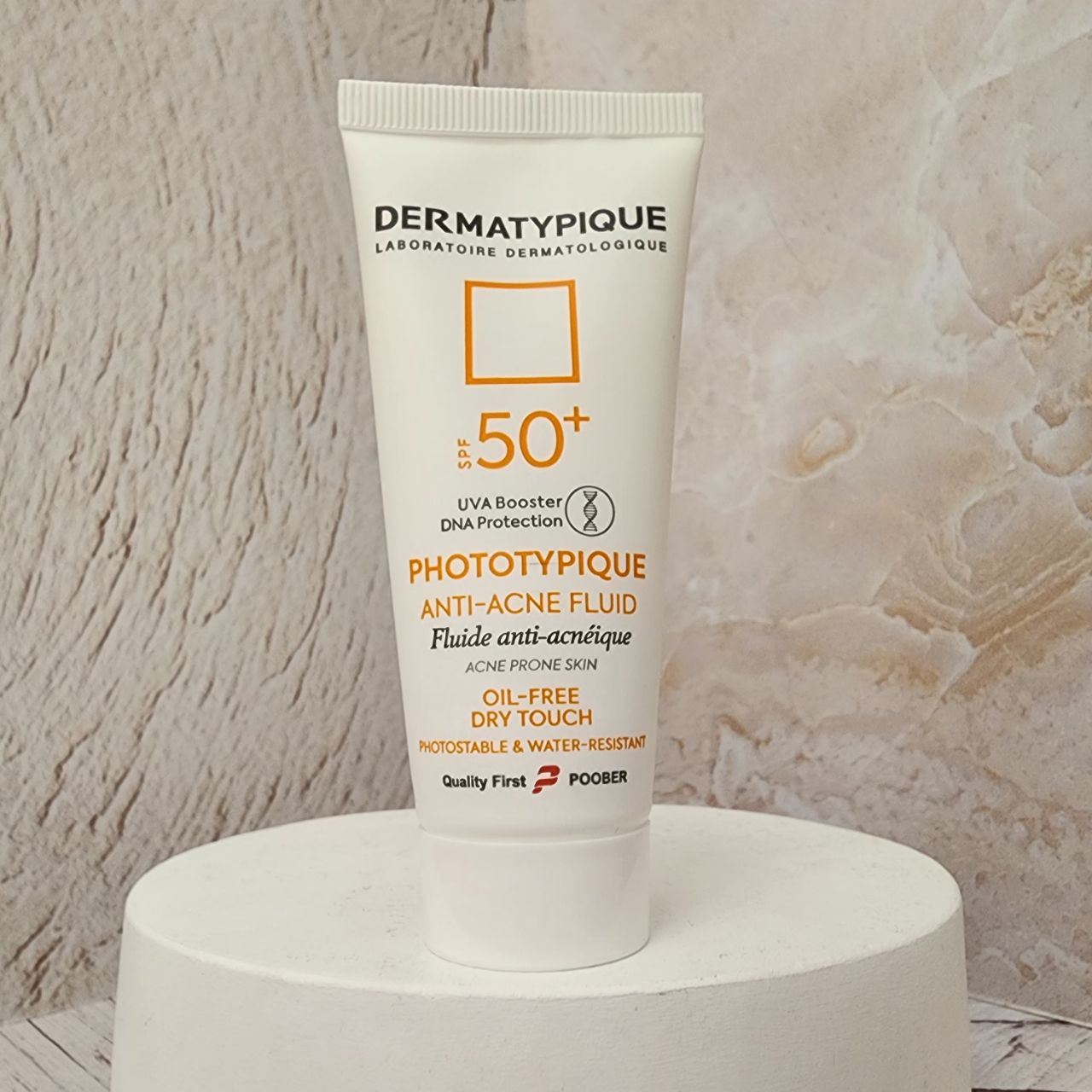 ضد آفتاب فلوئید آنتی آکنه درماتیپیک مدل Phototypique با Spf +50 مناسب پوست چرب و جوش دار حجم 40 میلی لیتر - تصویر 2